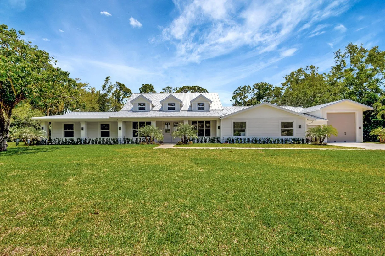 South Florida Real Estate | View 15014 72nd Drive | 6 Beds, 4 Baths