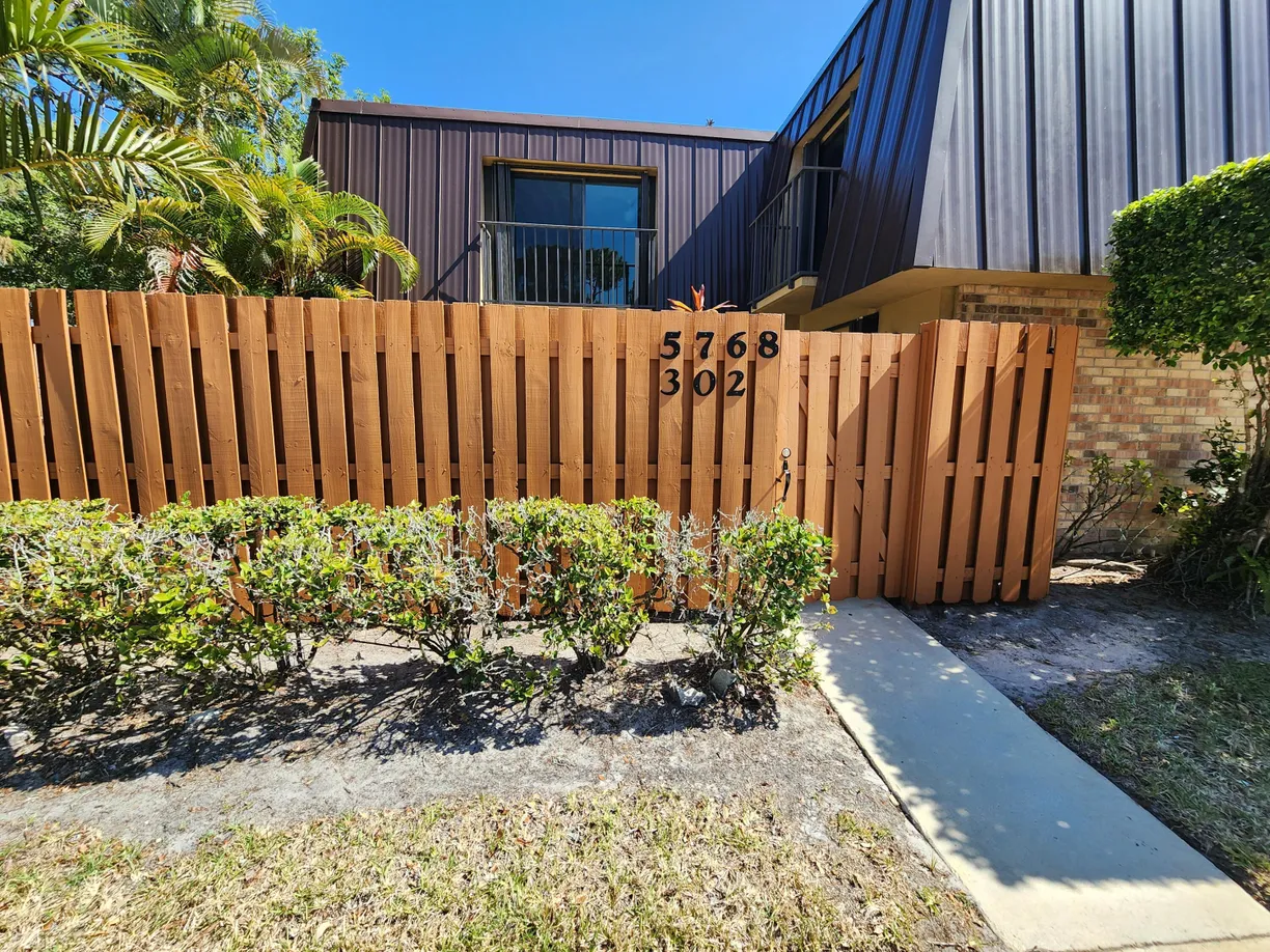 South Florida Real Estate | View 5768 SE Windsong Lane | 2 Beds, 2 Baths