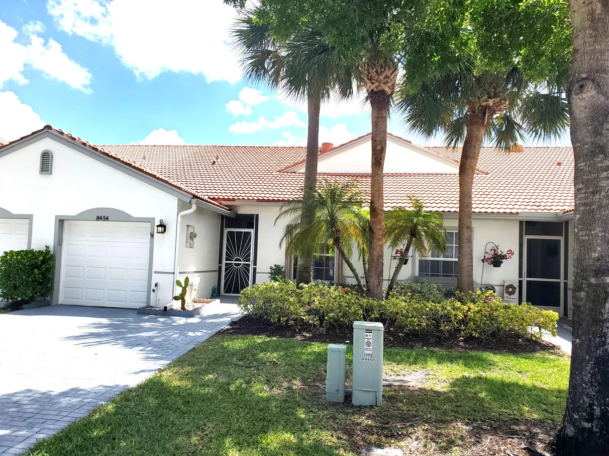 South Florida Real Estate | View 8454 Logia Circle | 3 Beds, 2 Baths