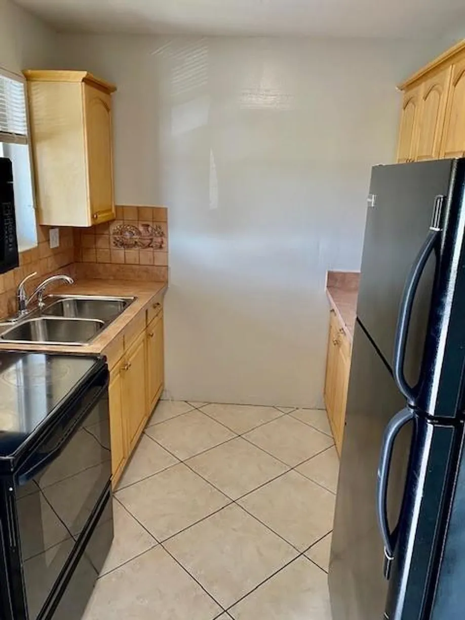 South Florida Real Estate | View 6048 Forest Hill Boulevard, 202 | Listing