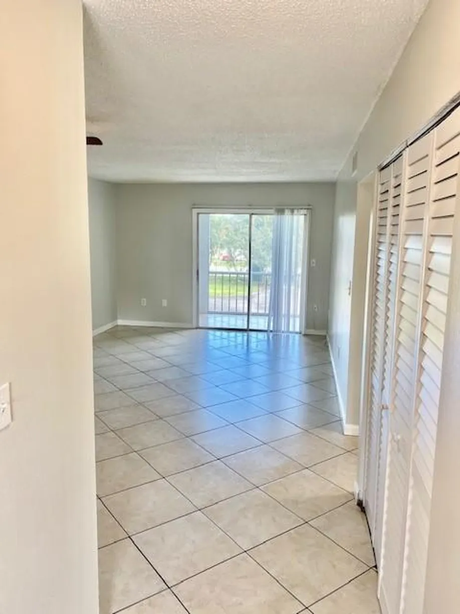 South Florida Real Estate | View 6048 Forest Hill Boulevard, 202 | 2 Beds, 1 Bath