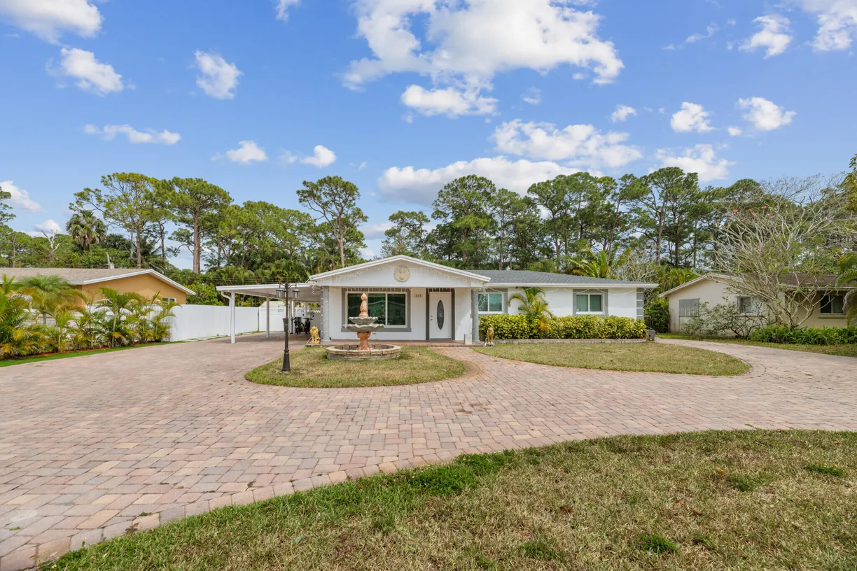 South Florida Real Estate | View 410 Forest Estate Drive | 4 Beds, 3 Baths