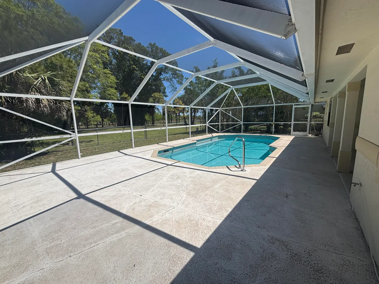 South Florida Real Estate | View 123 Sandpiper Ave | 3 Beds, 2 Baths