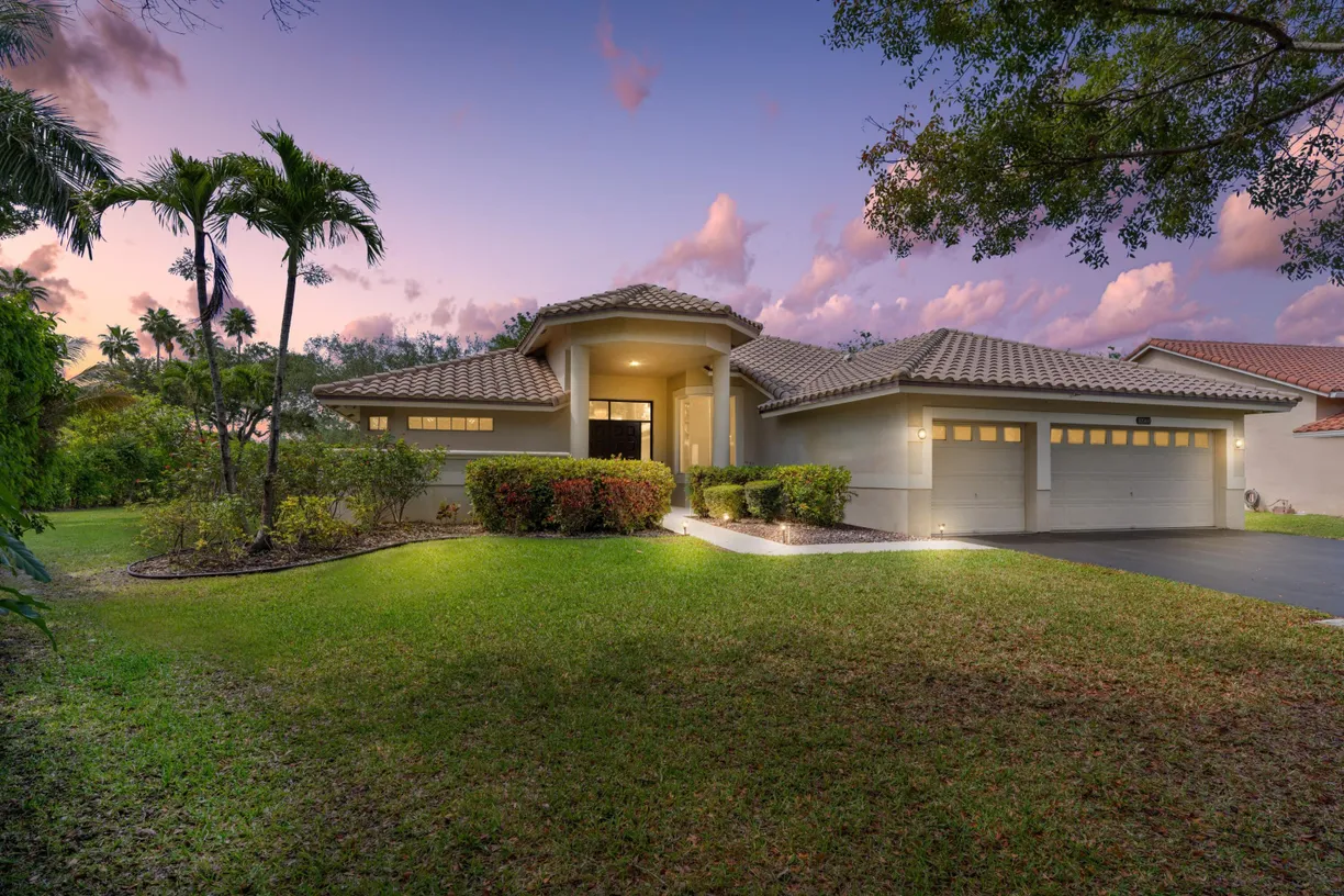 South Florida Real Estate | View 10969 NW 55th Street | 4 Beds, 3 Baths