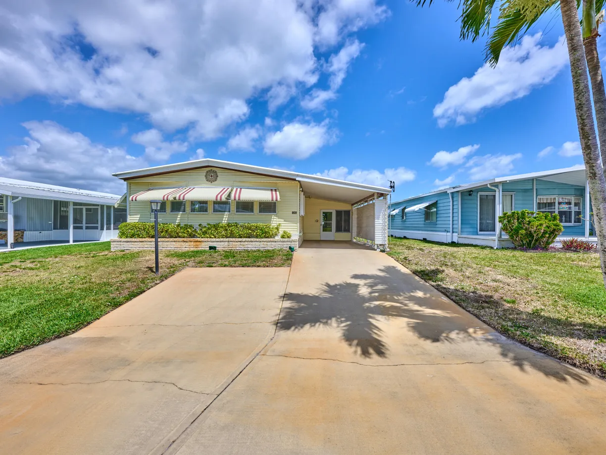 South Florida Real Estate | View 6939 SE Congress Street | 2 Beds, 2 Baths