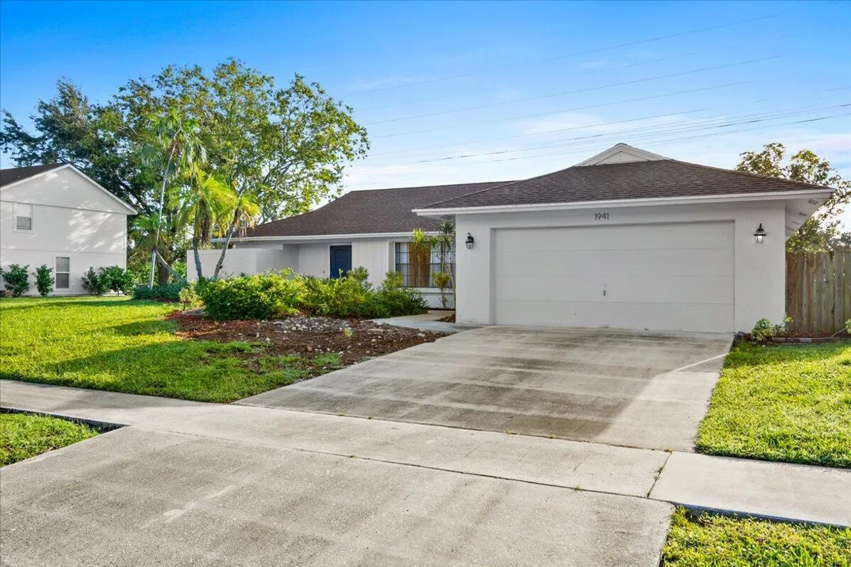 South Florida Real Estate | View 1941 Shower Tree Way | 3 Beds, 2 Baths