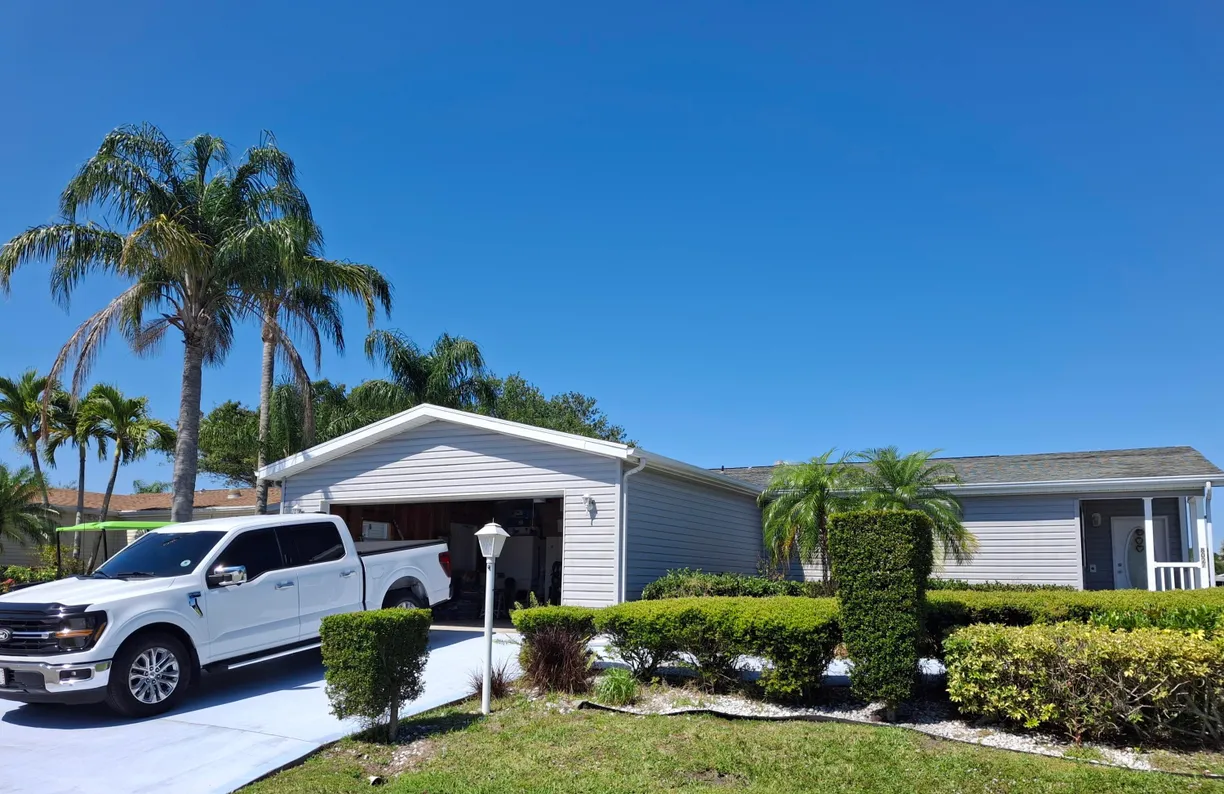 South Florida Real Estate | View 8027 9th Hole Drive | 2 Beds, 2 Baths