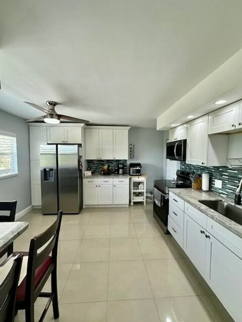 South Florida Real Estate | View 1750 Hammock Boulevard, 402 | 3 Beds, 2 Baths