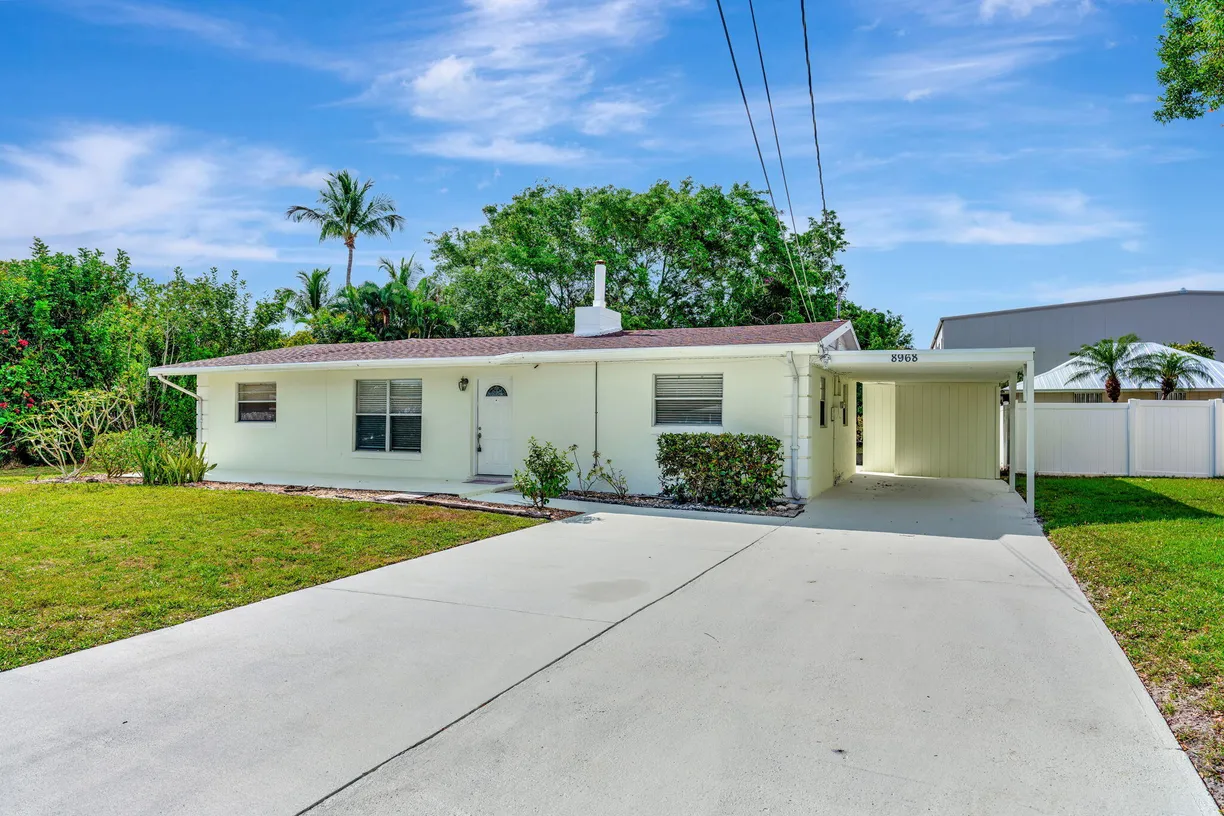 South Florida Real Estate | View 8968 SE Pine Cone Lane | 3 Beds, 2 Baths