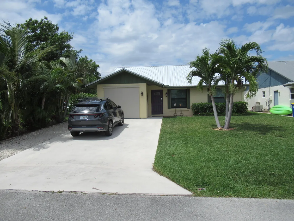 South Florida Real Estate | View 5832 SE Collins Avenue | 3 Beds, 2 Baths