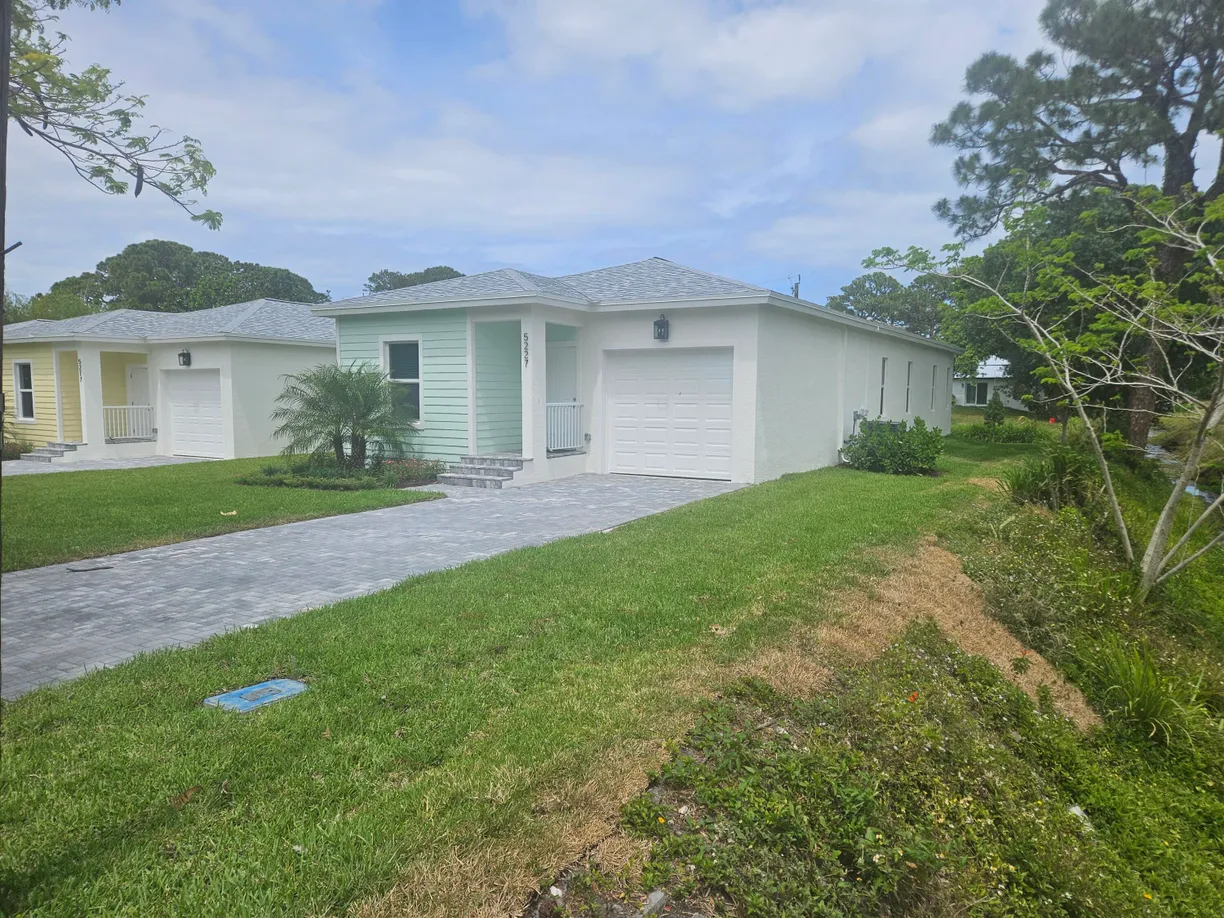 South Florida Real Estate | View 5227 SE Isabelita Avenue | 3 Beds, 2 Baths