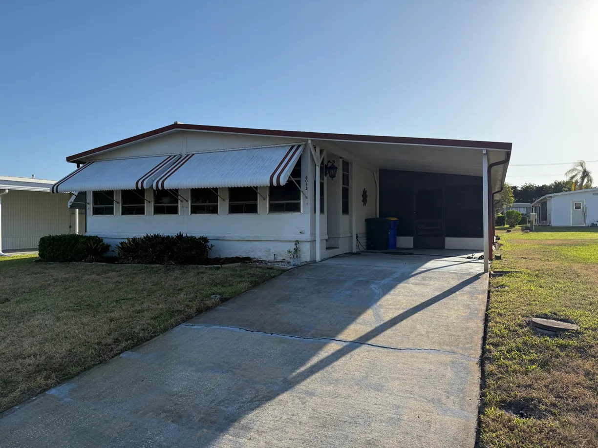 South Florida Real Estate | View 8053 SE Patriot Avenue | 2 Beds, 2 Baths
