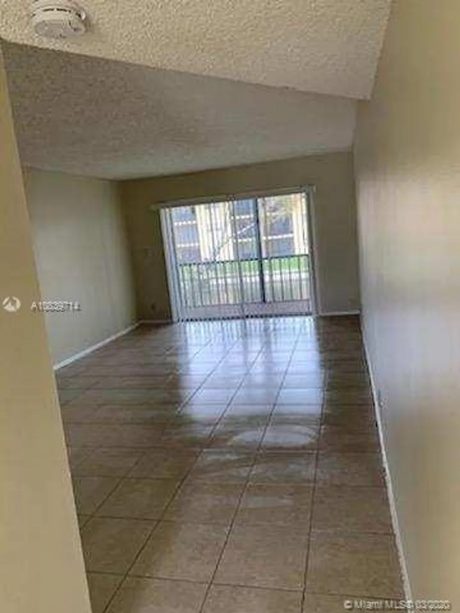 South Florida Real Estate | View 7925 S Colony Cir S, 207 | 1 Bed, 1 Bath