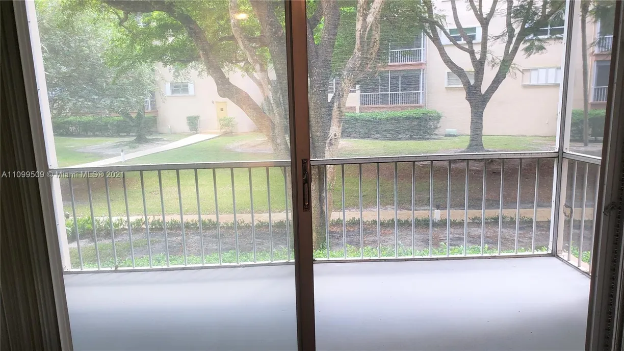 South Florida Real Estate | View 6731 Cypress Rd, 105 | 1 Bed, 1 Bath
