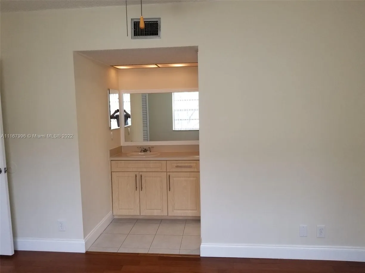 South Florida Real Estate | View 3232 NW 102nd Ter, 205-F | Listing