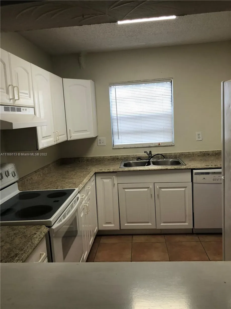 South Florida Real Estate | View 3281 E Golf Blvd, 26 | Listing