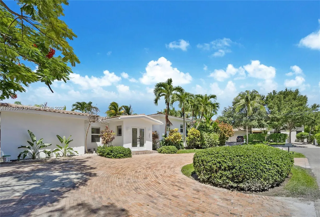 South Florida Real Estate | View 201 Greenwood Dr | 4 Beds, 4 Baths