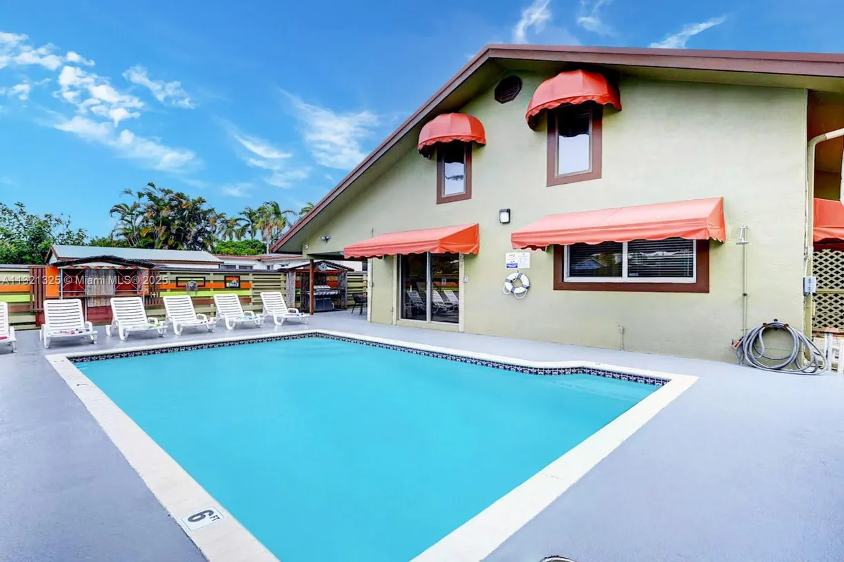 South Florida Real Estate | View 1020 N 13th Ter | 6 Beds, 4 Baths