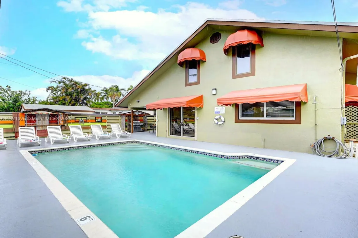 South Florida Real Estate | View 1020 N 13th Ter | 6 Beds, 4 Baths