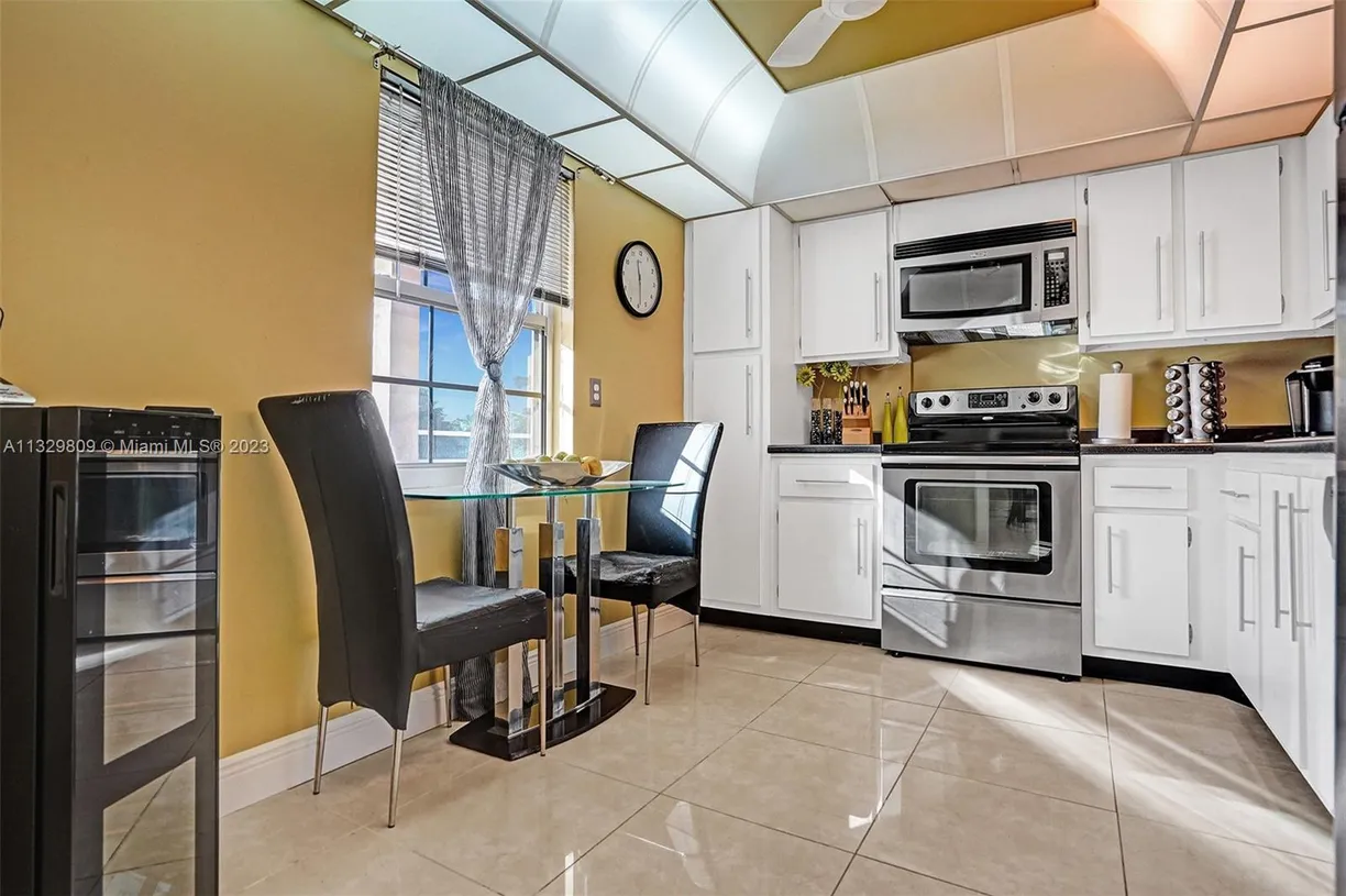 South Florida Real Estate | View 3800 Oaks Clubhouse Dr, 309 | 3 Beds, 2 Baths