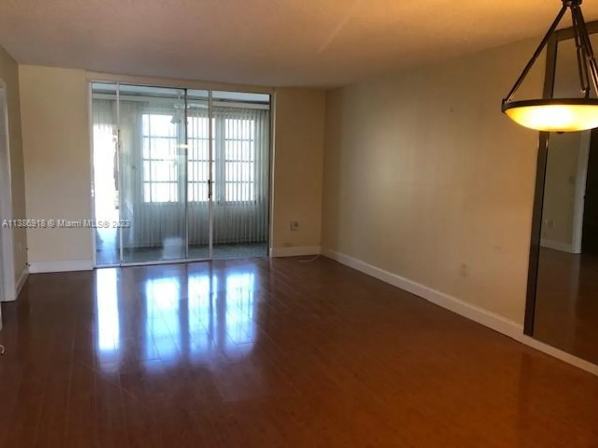 South Florida Real Estate | View 8515 Sunrise Lakes Blvd, 111 | Listing