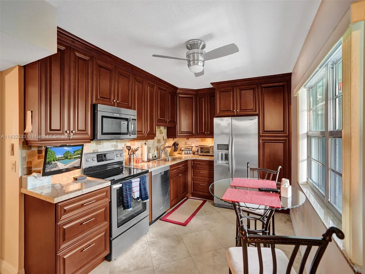 South Florida Real Estate | View 802 Cypress Grove Ln, 402 | 3 Beds, 2 Baths