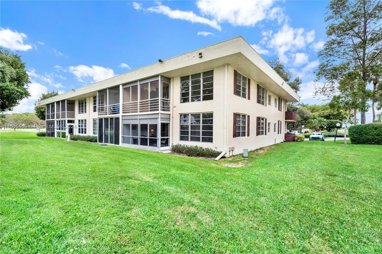 South Florida Real Estate | View 3200 Course Ln, 116 | 3 Beds, 2 Baths