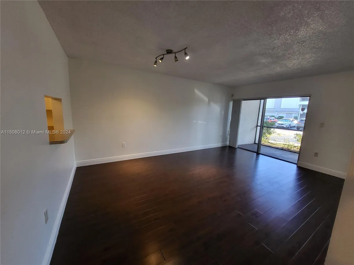 South Florida Real Estate | View 711 N Pine Island Rd, 111 | Listing