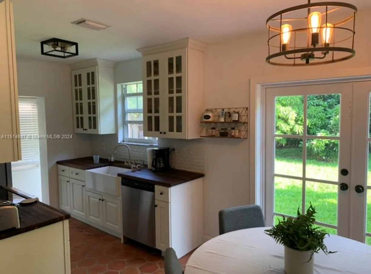 South Florida Real Estate | View 4619 SW 10th St | 3 Beds, 2 Baths