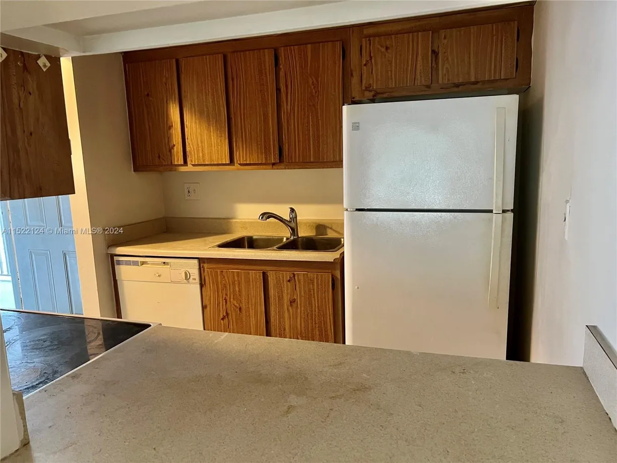 South Florida Real Estate | View 2000 N Congress Ave, 205 | Listing