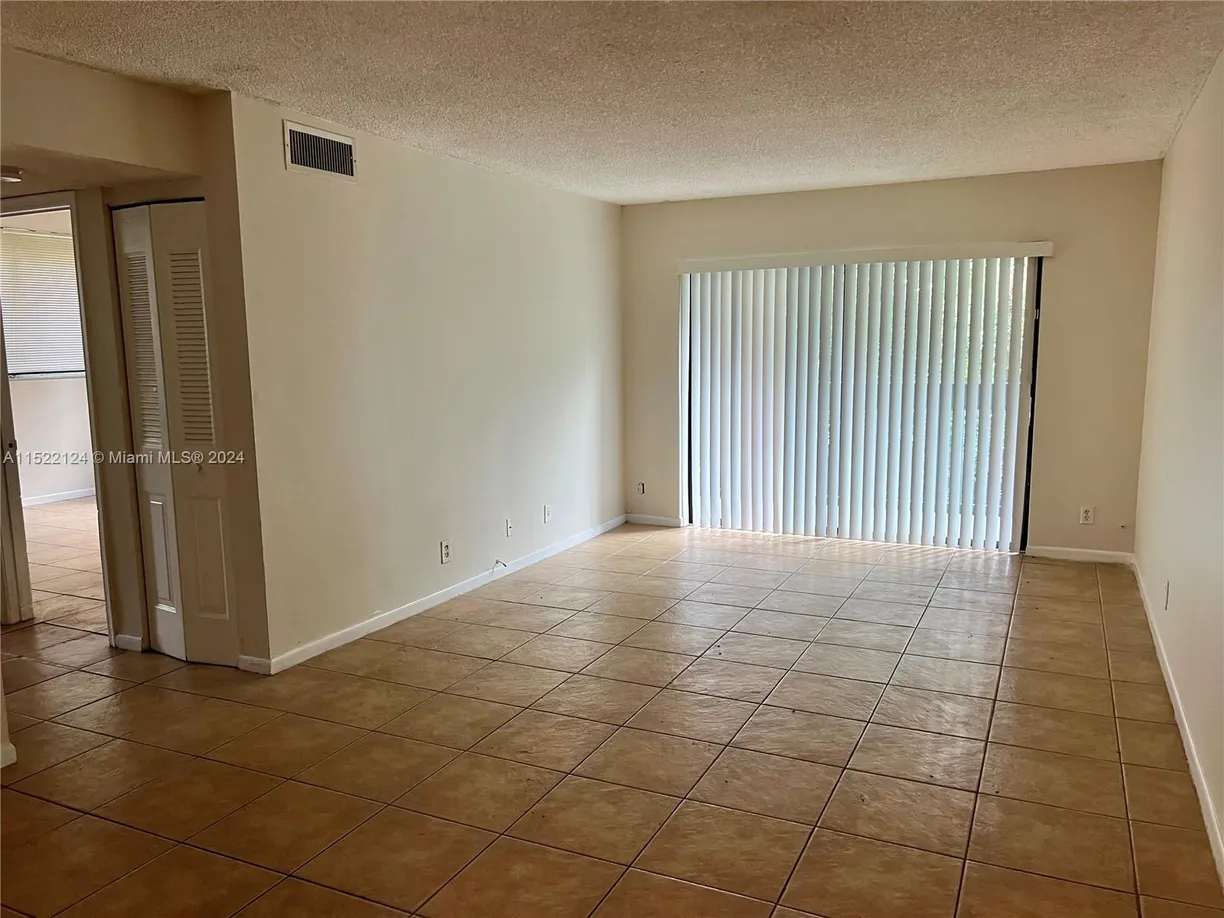 South Florida Real Estate | View 2000 N Congress Ave, 205 | Listing