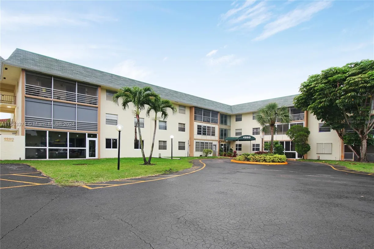 South Florida Real Estate | View 4990 E Sabal Palm Blvd, 211 | 2 Beds, 2 Baths