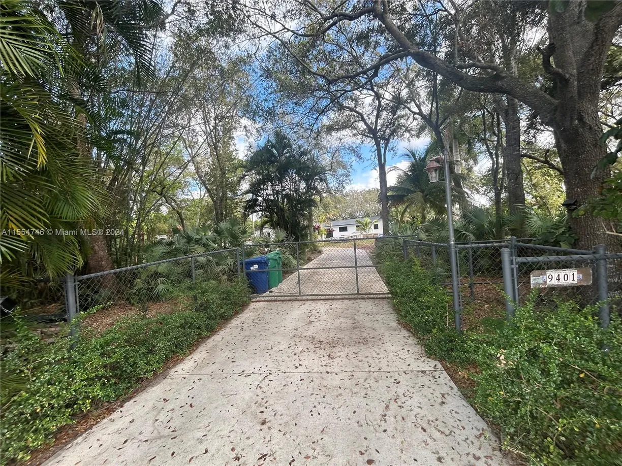 South Florida Real Estate | View 9401 SW 106th St | 5 Beds, 3 Baths