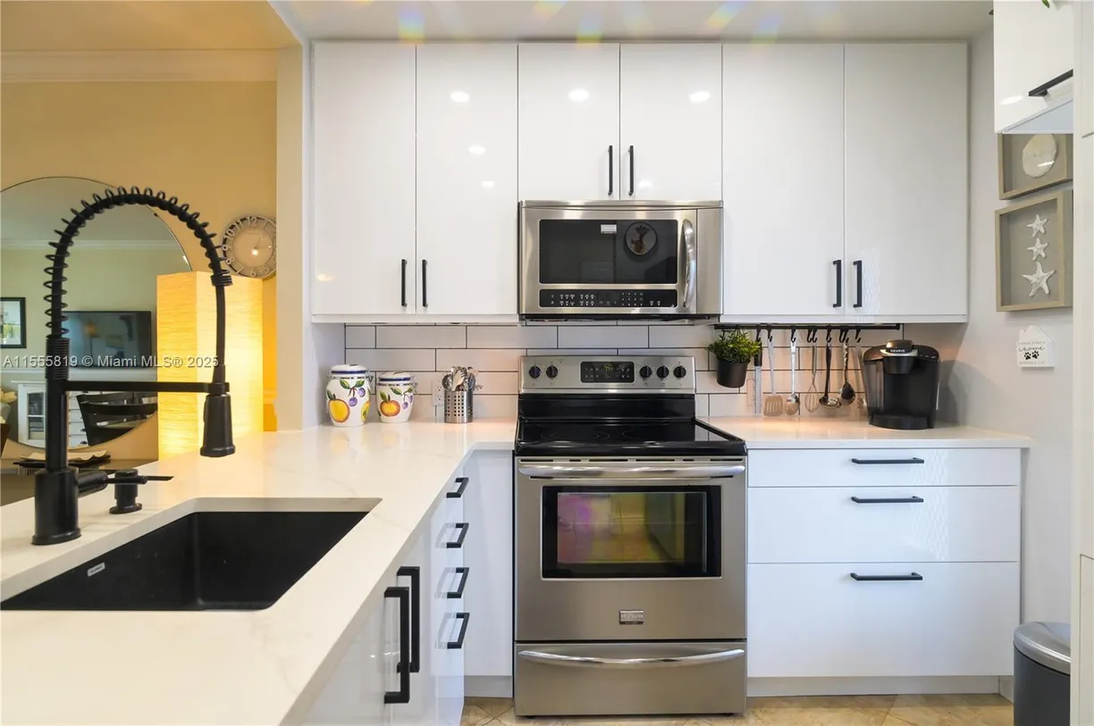 South Florida Real Estate | View 4411 NW 16th St, F301 | 2 Beds, 2 Baths