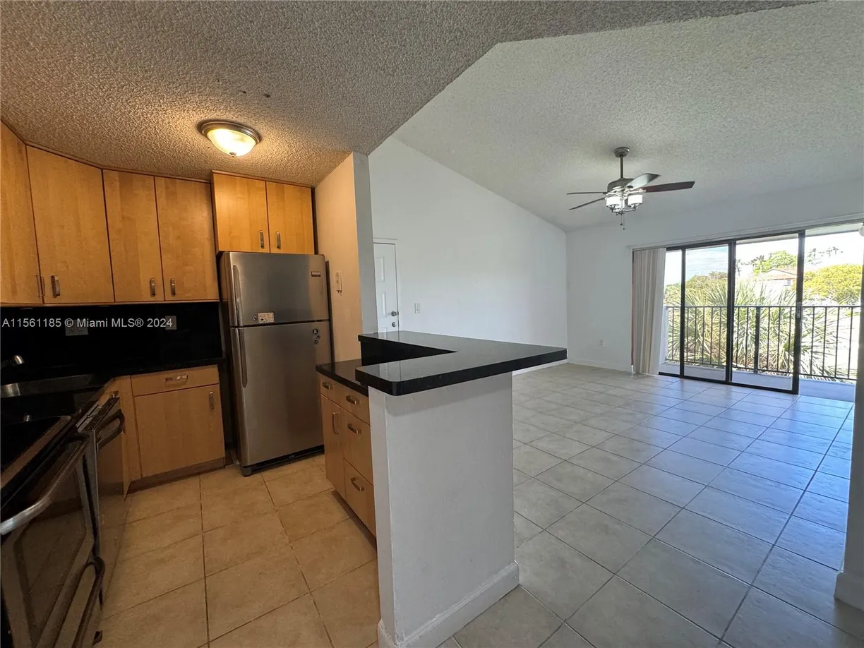 South Florida Real Estate | View 7235 NW 179th St, 311 | 2 Beds, 2 Baths