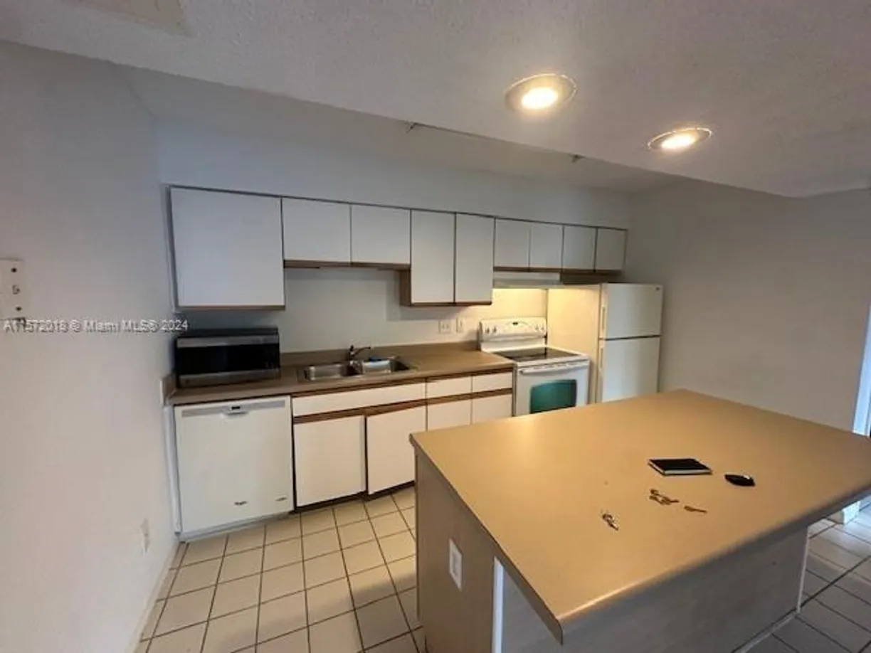South Florida Real Estate | View 3985 W Mcnab Rd, A111 | Listing
