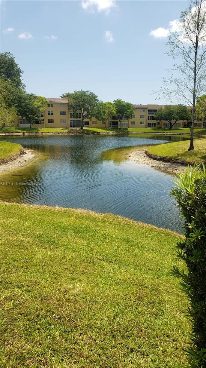 South Florida Real Estate | View 6071 NW 61st Ave, 311 | 2 Beds, 2 Baths