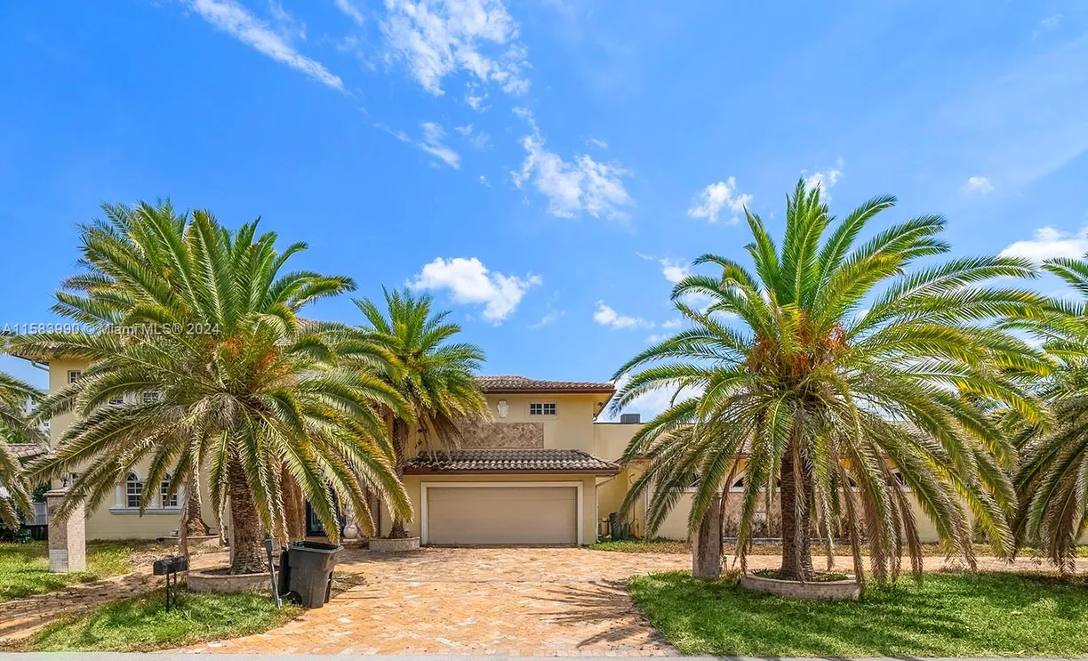 South Florida Real Estate | View 3356 NE 42nd Ct | 6 Beds, 6 Baths