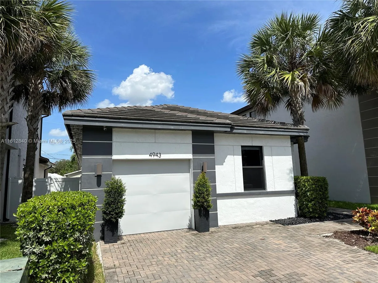 South Florida Real Estate | View 4943 Whispering Way | 3 Beds, 2 Baths