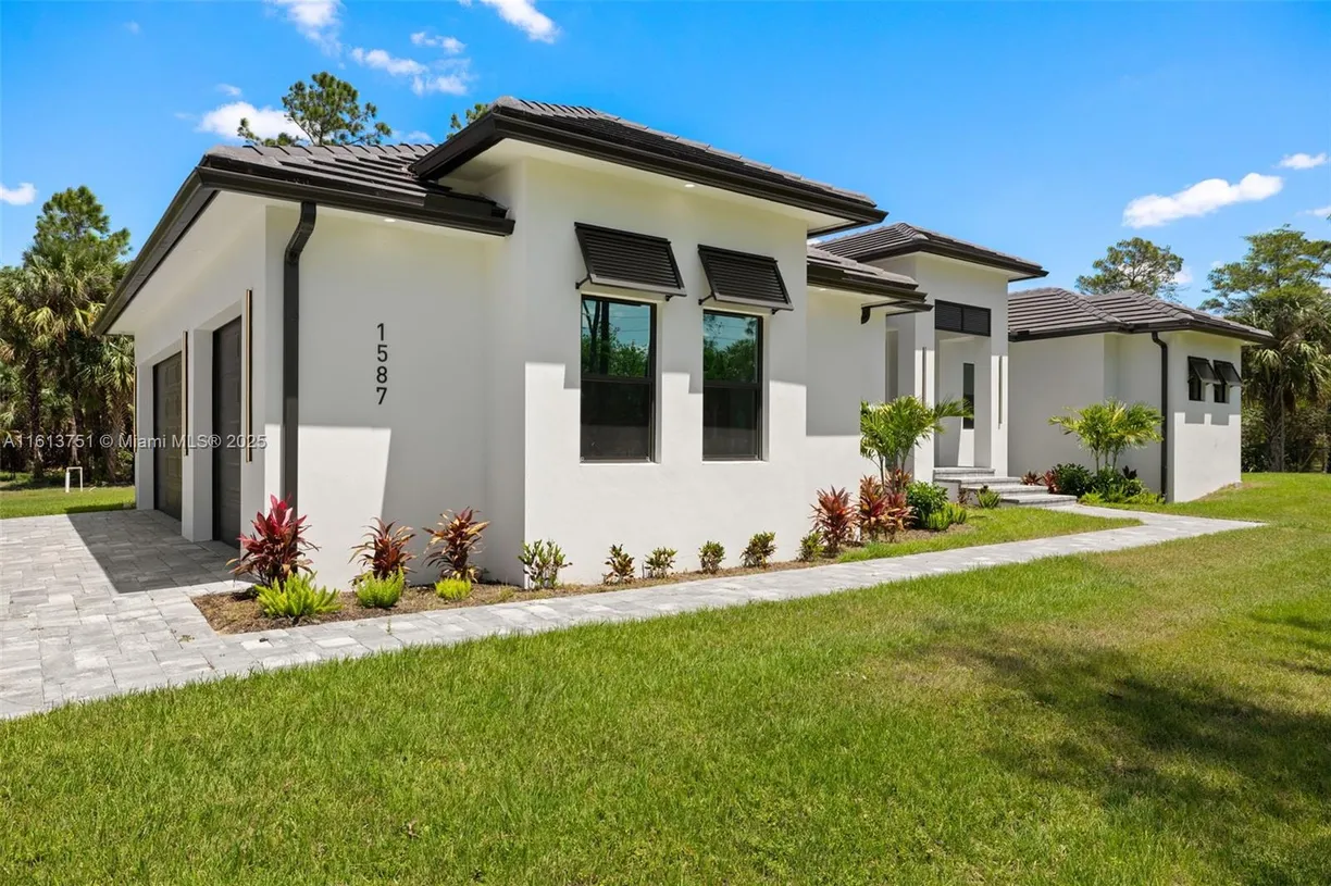 South Florida Real Estate | View 1587 W GOLDEN GATE BLVD | Listing