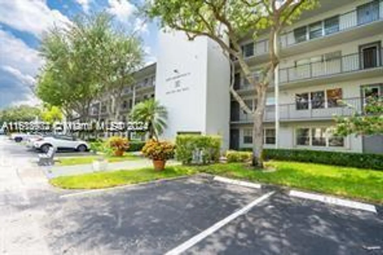 South Florida Real Estate | View 300 SW 134th Way, 205E | 2 Beds, 1 Bath