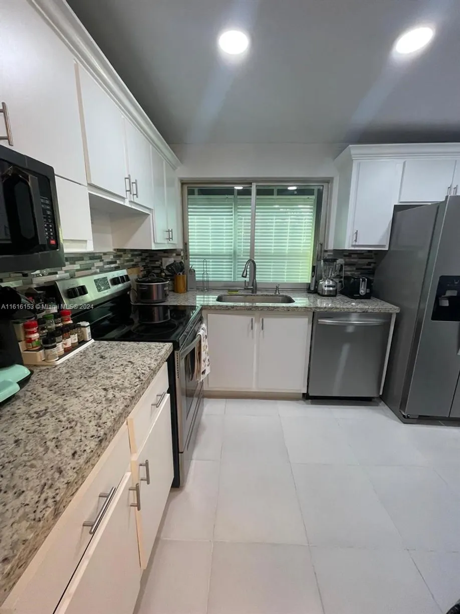 South Florida Real Estate | View 9081 Lime Bay Blvd, 211 | 2 Beds, 2 Baths