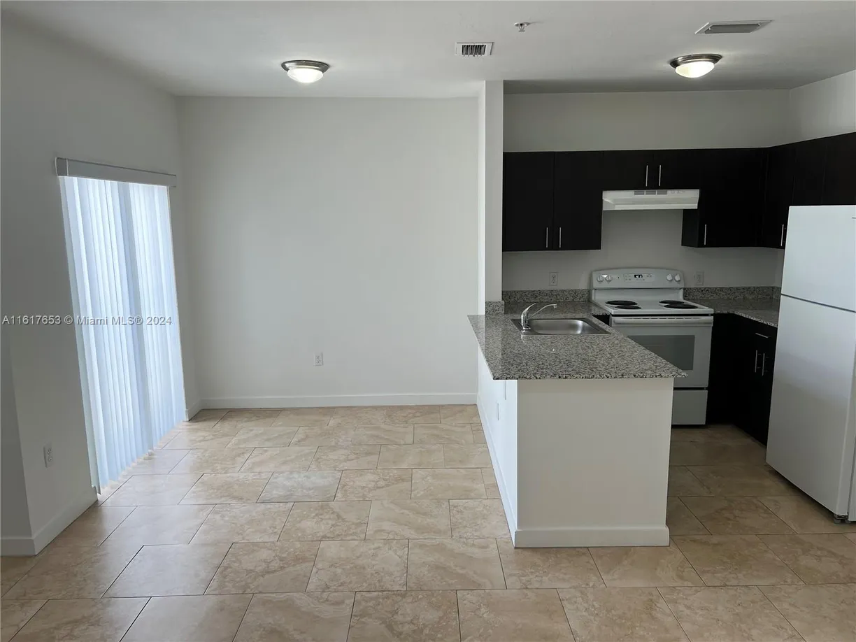 South Florida Real Estate | View 7939 W 2nd Ct, 105 | Listing