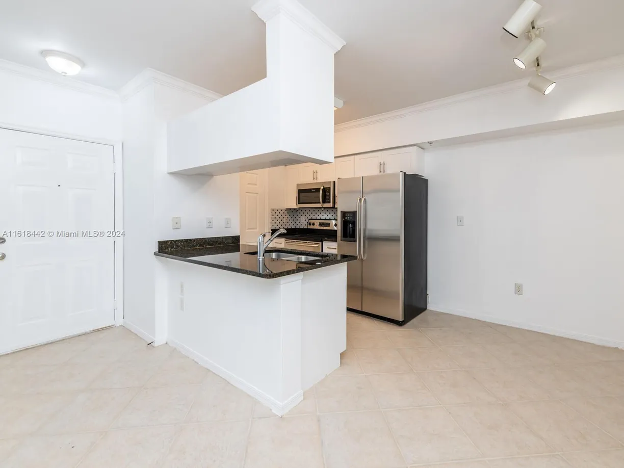 South Florida Real Estate | View 6492 Emerald Dunes Dr, 206 | Listing