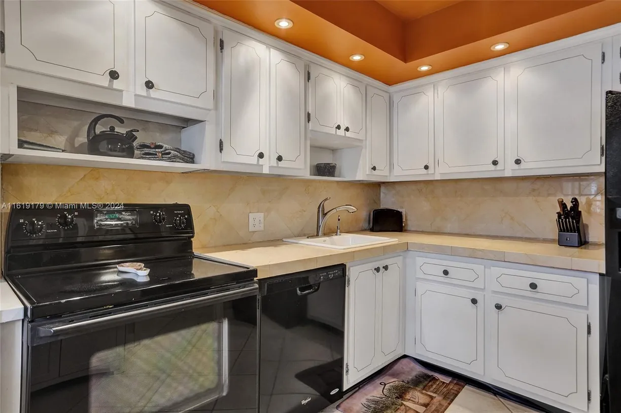 South Florida Real Estate | View 3000 S Course Dr, 107 | Listing