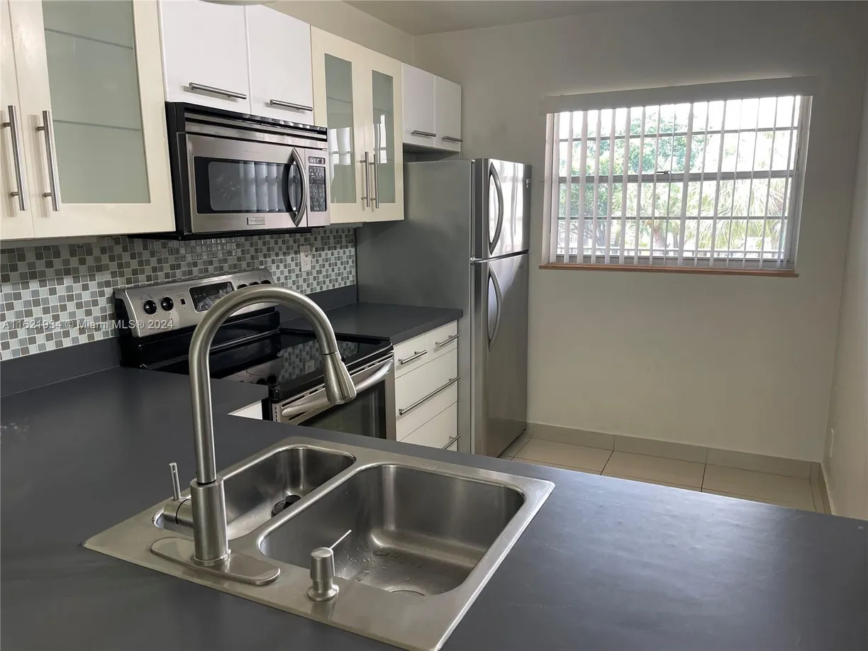 South Florida Real Estate | View 1900 Sabal Palm Dr, 302 | Listing