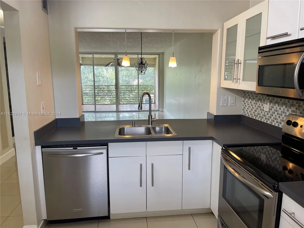 South Florida Real Estate | View 1900 Sabal Palm Dr, 302 | Listing