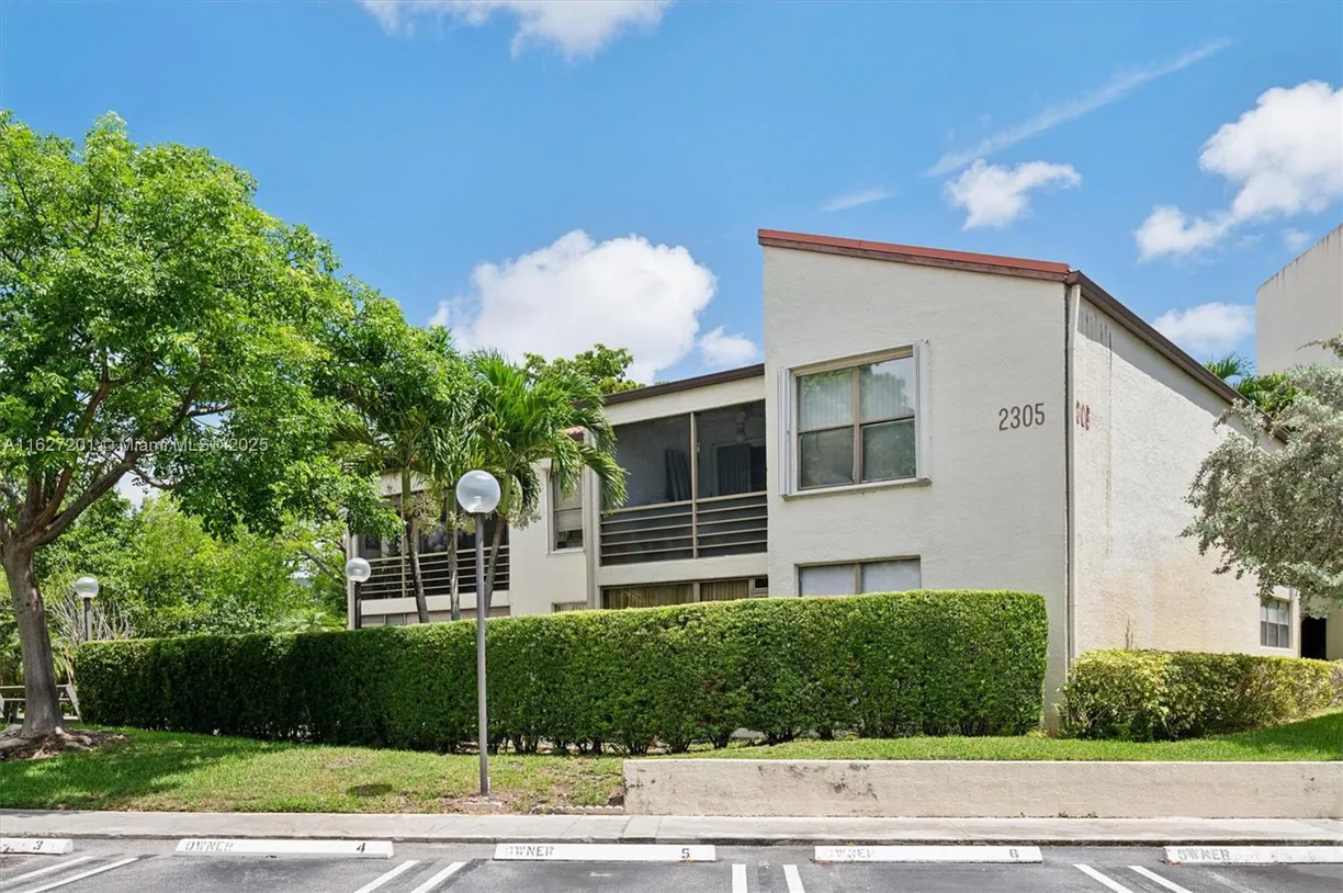 South Florida Real Estate | View 2305 S Cypress Bend Dr, 104D | Listing