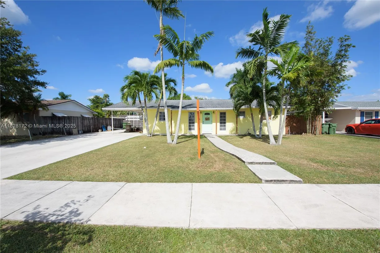 South Florida Real Estate | View 385 NW 16th St | 4 Beds, 2 Baths