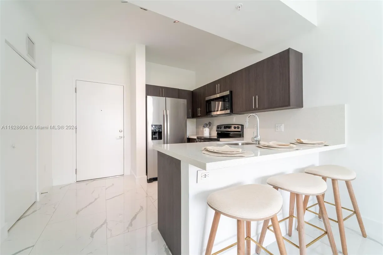 South Florida Real Estate | View 1 Curtiss Pkwy, 213 | Listing